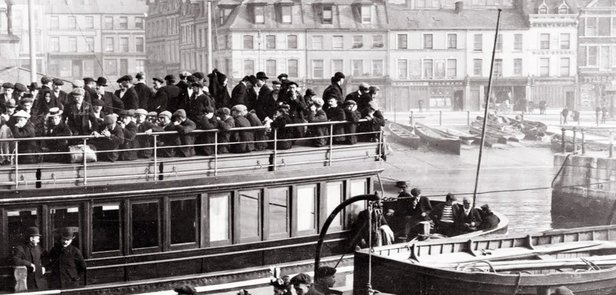 Old photo of a ship with immigrants
