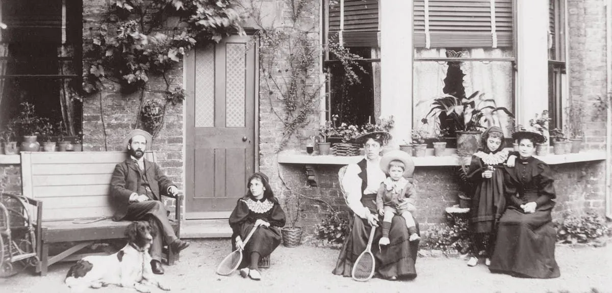 Family in Sussex garden with dog
