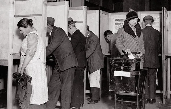 People at a voting booth