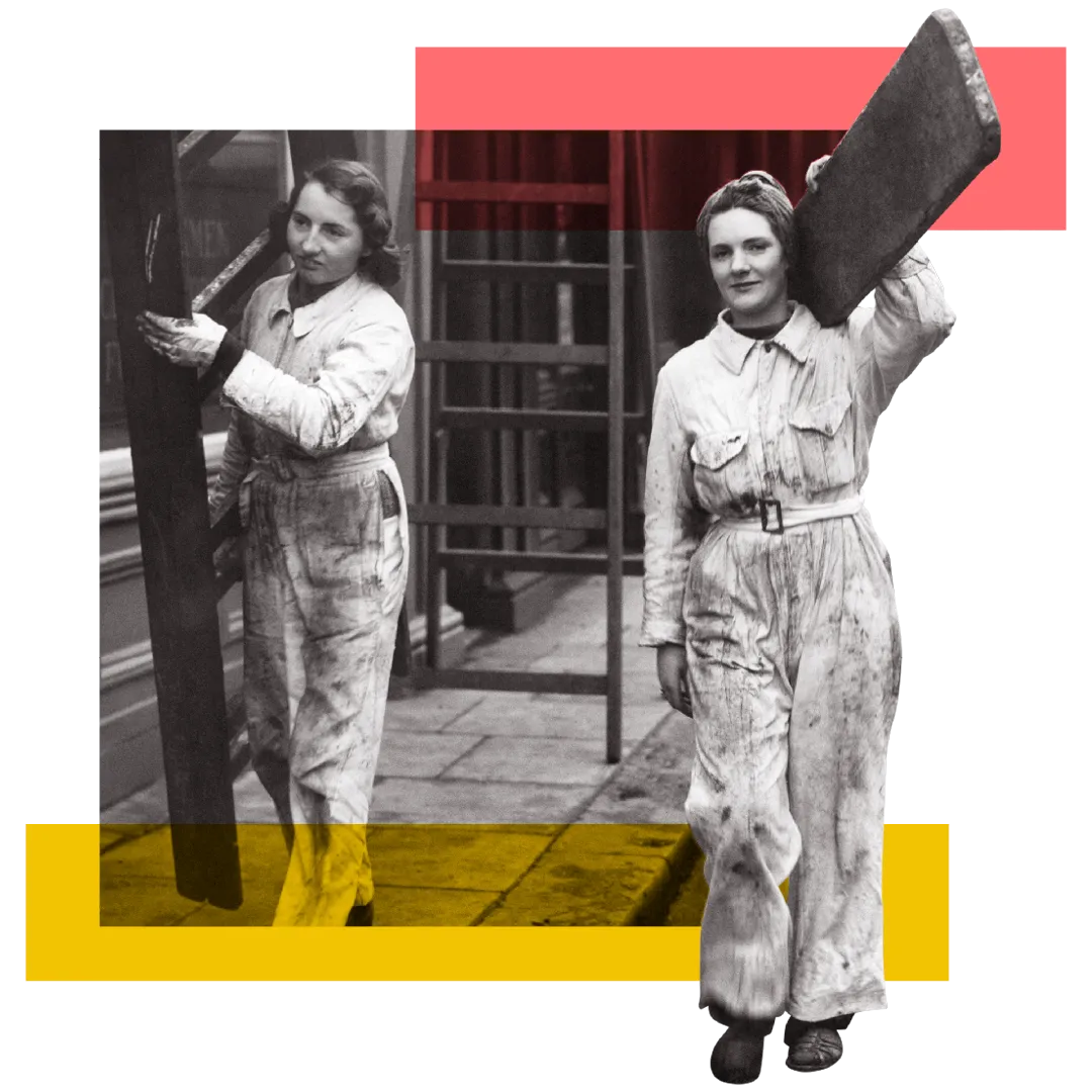 Two Land Girls carry work equipment during the second world war. 