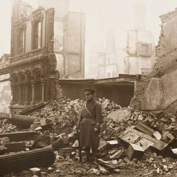 A guard in front of the remains of the Ulster and Leinster Bank in Dublin, destroyed by rebels in the Easter Rising